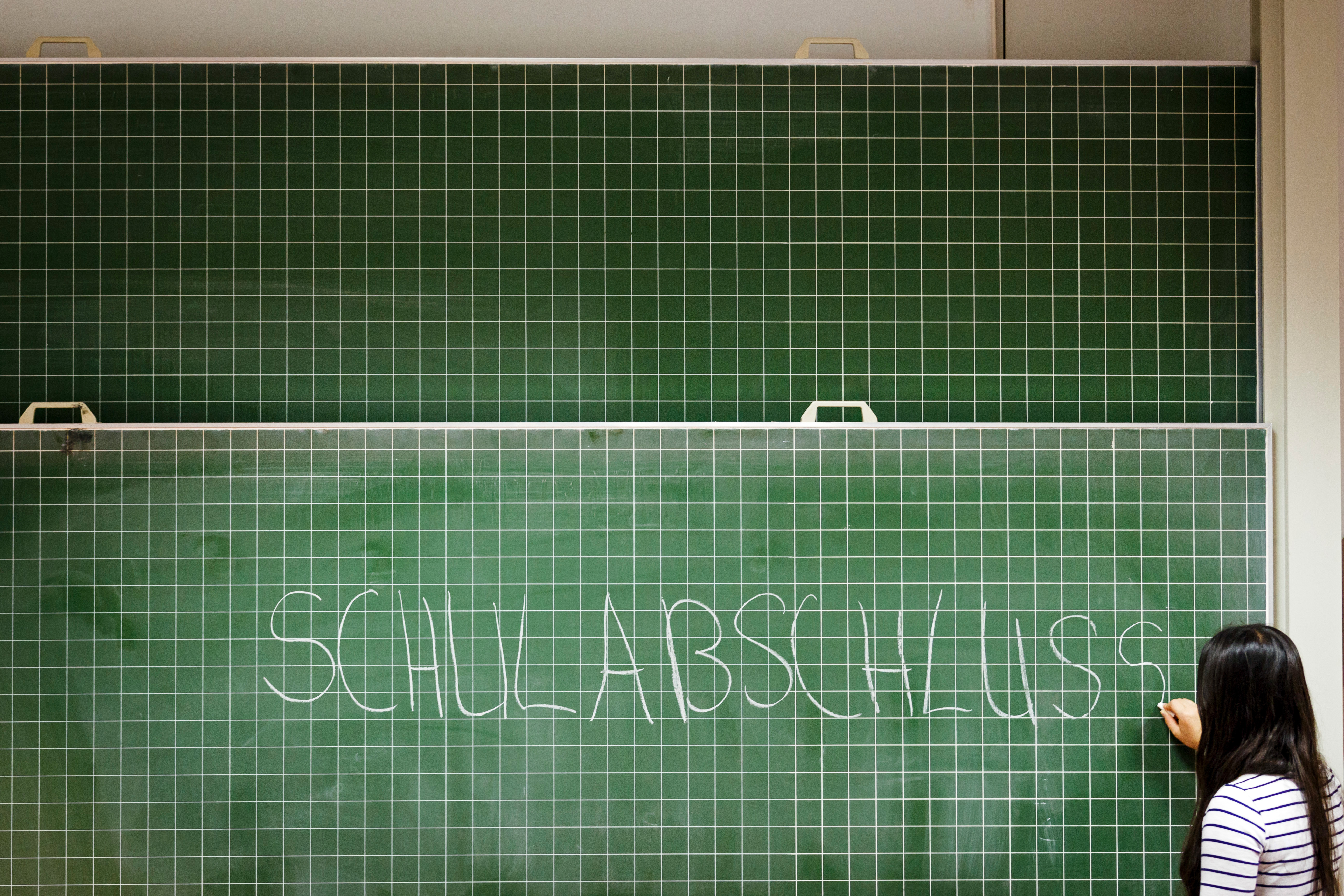 Schülerin an der Tafel
