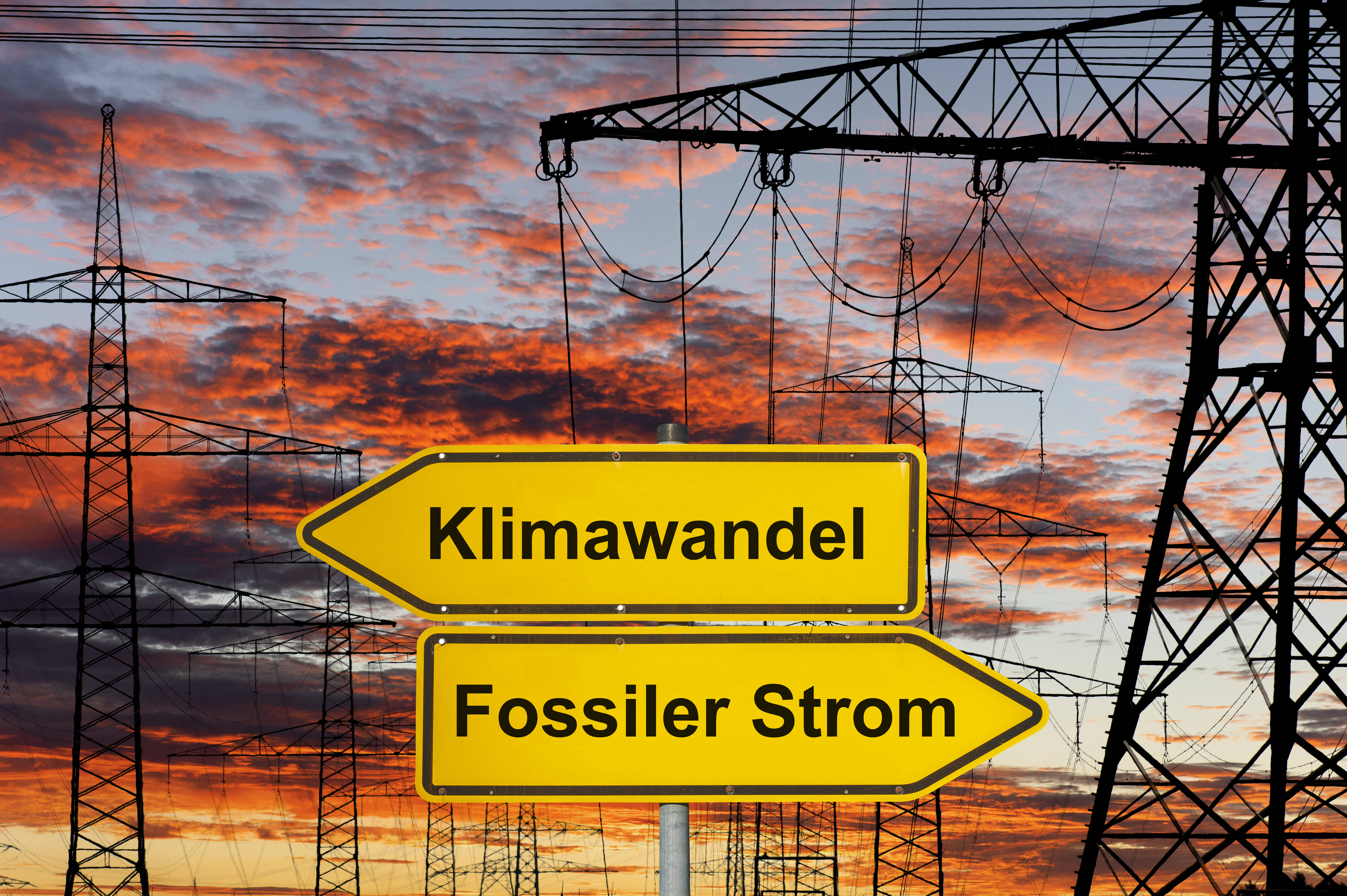Symbolfoto mit der Aufschrift Klimaziele Fossiler Strom